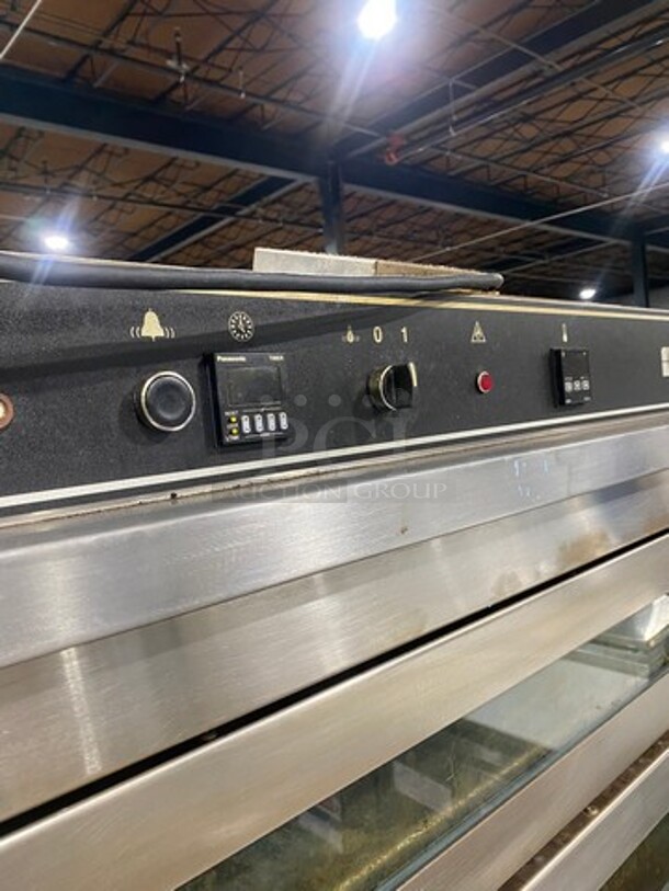 WOW! 2012 Doyon Commercial Natural Gas Powered Tripple Deck Pizza/ Baking Oven! With Shelf Storage Underneath! All Stainless Steel! On Casters! Model: PIZ6G SN: 282200000112 - Image 7 of 10