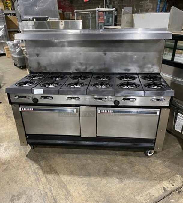 AMAZING FIND! Garland Natural Gas Powered 12 Burner Stove! With 2 Full-Sized Ovens! With Metal Oven Racks! With Raised Back Splash & Salamander Shelf! Stainless Steel! On Casters! WORKING WHEN REMOVED!
