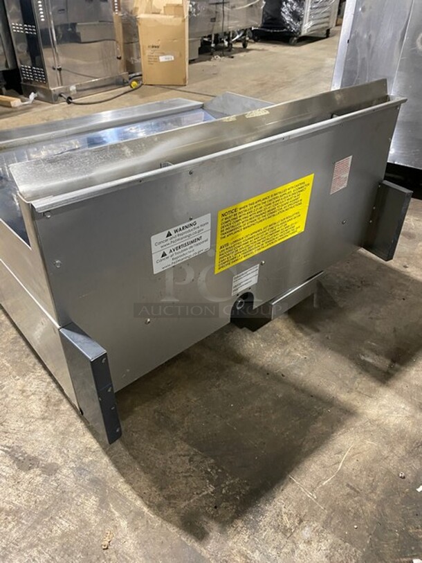 SWEET! BRAND NEW! NEVER USED! RARE FIND! Garland Commercial Natural Gas Powered Mirror Shine/Chrome Top Flat Griddle! Thermostatic Controlled! With Back & Side Splashes! Model GG36H Serial 2305100102118! On Small Legs!  - Image 4 of 9
