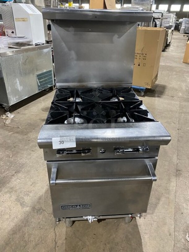 American Range Commercial Natural Gas Powered 4 Burner Stove! With Raised Back Splash And Salamander Shelf! With Oven Underneath! All Stainless Steel! On Legs! - Image 1 of 9