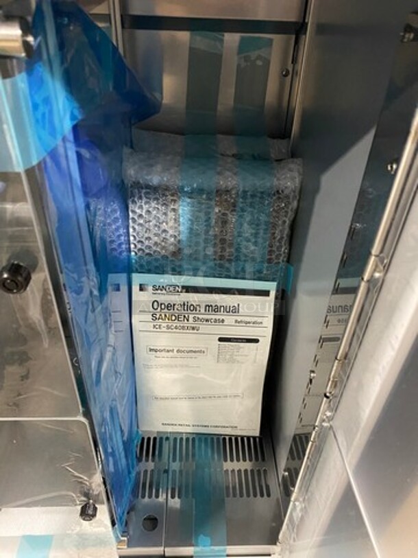 BEAUTIFUL! UNIQUE FIND! SCRATCH-N-DENT! Lumilinna Commercial Countertop/ Undercounter Single Door Slush Cooler! Using Very Precise Temperature Control, Lumilinna Can Hold Beverages Below Freezing — Without Freezing Them Solid. Water Normally Freezes At 32°F, But By Maintaining This Temperature, Lumilinna Can Store Beverages To The Coldest Temperature That Once Opened, Ice Crystals Form! Supercooled Products Crystallize When Poured, Producing A Soft Delicate Ice Slush! Model: ICESC40BXIWU SN: A19300018 115V 60HZ 1 Phase - Image 7 of 10