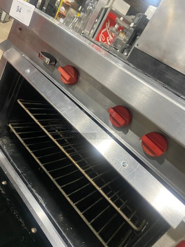 Vulcan Commercial Natural Gas Powered 4 Burner Stove! With Raised Back Splash Double shelf! With Oven Underneath! All Stainless Steel! On Casters! - Image 9 of 10