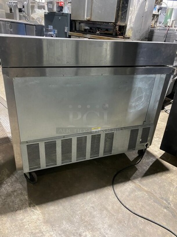 Nice! Beverage Air Commercial Refrigerated Sandwich Prep Table! With Commercial Cutting Board! With 2 Door Underneath Storage Space! With Poly Coated Racks! All Stainless Steel! On Casters! Model: SPE4812 115V 60HZ 1 Phase! Working When Removed! - Image 3 of 9