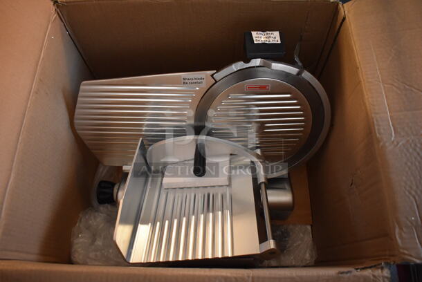 BRAND NEW IN BOX! Avantco SL312 Stainless Steel Commercial Countertop Meat Slicer w/ Blade Sharpener. 115 Volts, 1 Phase. 23x18x17. Tested and Working! - Image 1 of 7