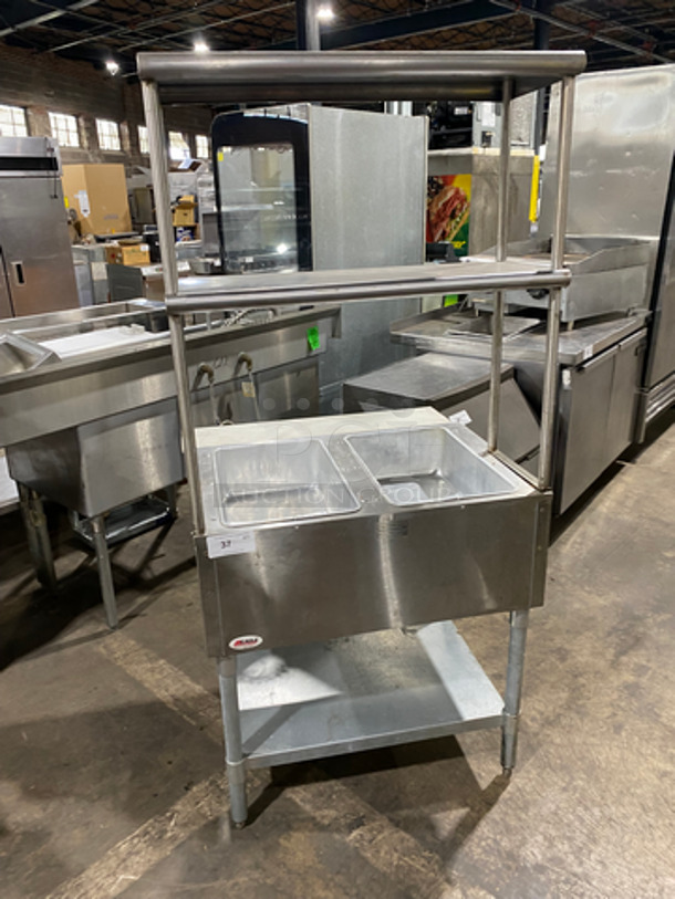 NICE! LATE MODEL! 2019 Eagle Commercial Gas Powered 2 Bay Steam Table! With Commercial Cutting Board! With 2 Over Head Shelves! With Storage Space Underneath! All Stainless Steel! On Legs! Working When Removed! Model: HT2NG SN: 1904150004