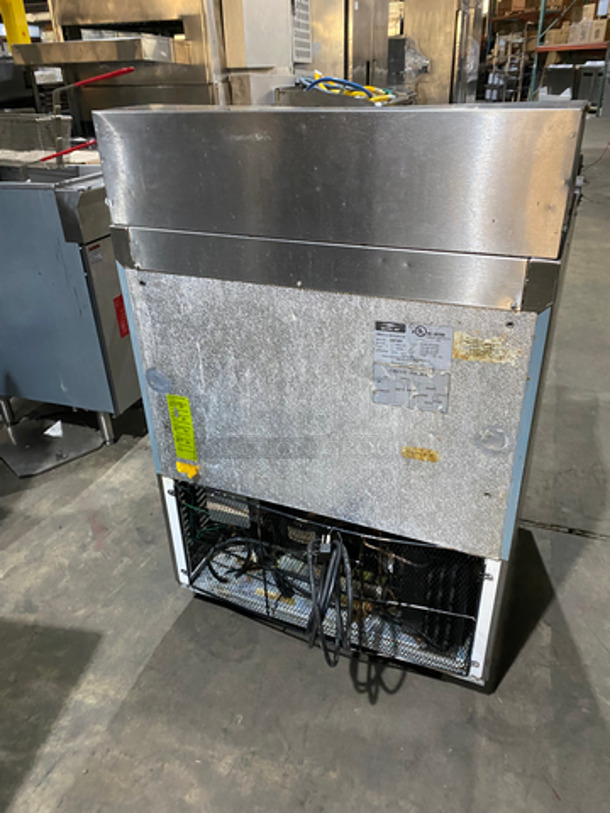 WOW! Artic Air Commercial Refrigerated Sandwich/Salad Prep Table! With Single Door Storage Space Underneath! With Poly Coated Rack! All Stainless Steel! On Casters! Model: AST28R SN: 5082984 115V 60HZ - Image 4 of 10