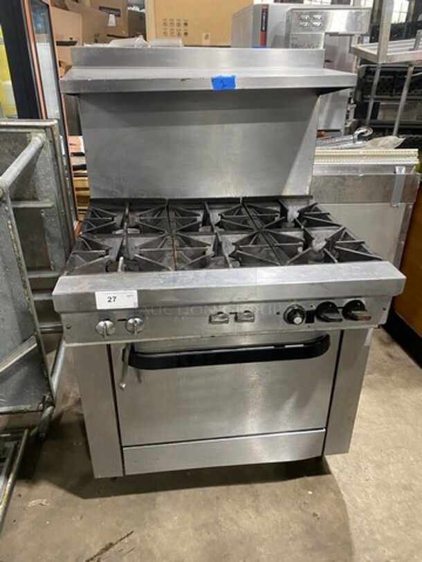 Commercial Natural Gas Powered 6 Burner Stove! With Raised Back Splash And Salamander Shelf! With Oven Underneath! All Stainless Steel! On Legs! - Image 1 of 10