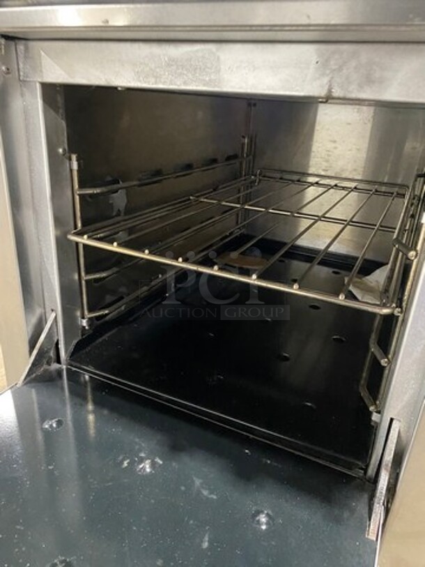 Montague Commercial Natural Gas Powered 4 Burner Stove! With Raised Back Splash And Salamander Shelf! With Oven Underneath! All Stainless Steel! On Legs! - Image 7 of 10
