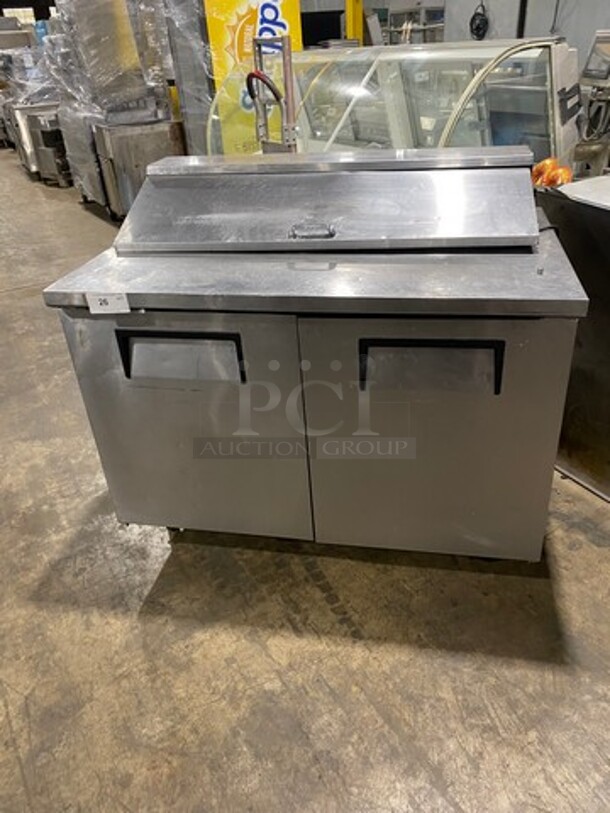 True Commercial Refrigerated Sandwich Prep Table! With 2 Door Underneath Storage Space! Poly Coated Racks! All Stainless Steel! On Casters! Model: TSSU4812 SN: 7765678 115V 60HZ 1 Phase