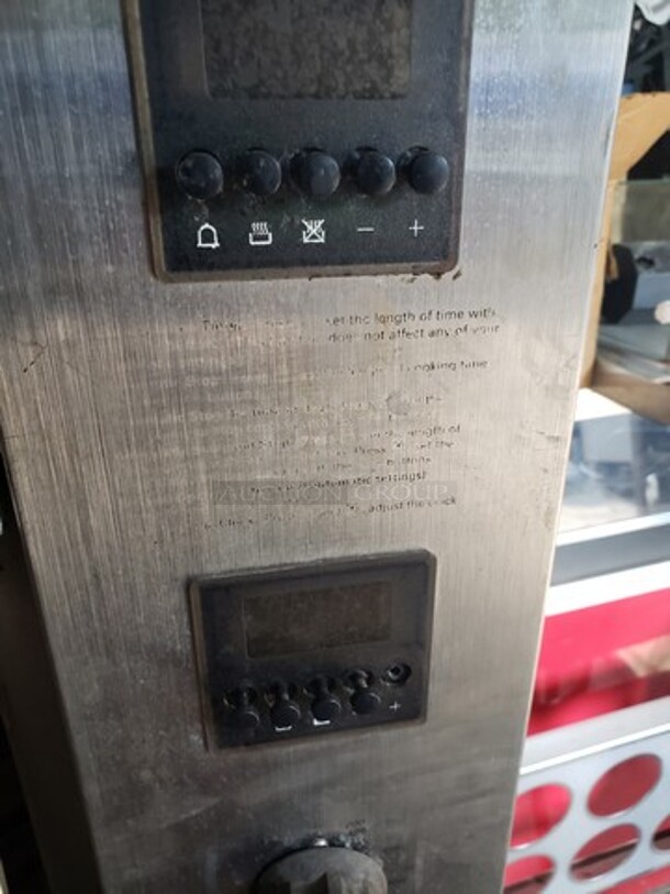 Hickory 10.10E Electric Rotisserie Oven on Casters! Left side of the oven has a small dent. Missing one knob and one knob is broken and needs to be replaced. 

Motor 120V, 1PH
Heating Elements 208V, 3PH - Image 7 of 10