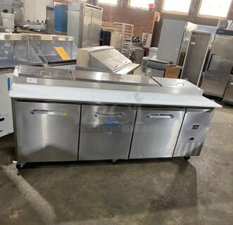 NICE! Kelvinator Commercial Refrigerated Pizza Prep Table! With Commercial Cutting Board! With 3 Door Storage Space Underneath! All Stainless Steel! On Casters! Model: KCHPT9212 SN:20720187 115V