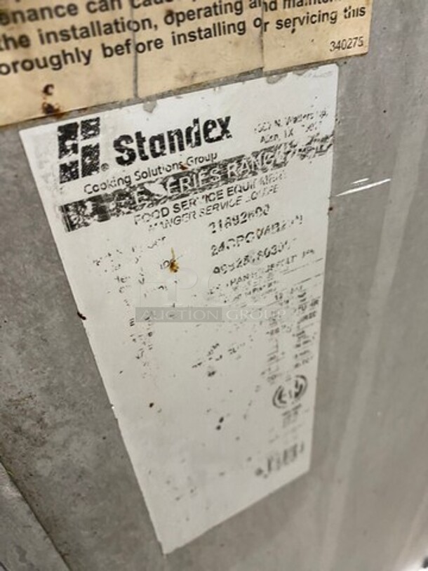 Commercial Natural Gas Powered 4 Burner Stove! With Raised Back Splash! With Oven Underneath! Stainless Steel Body! On Casters! - Image 10 of 10