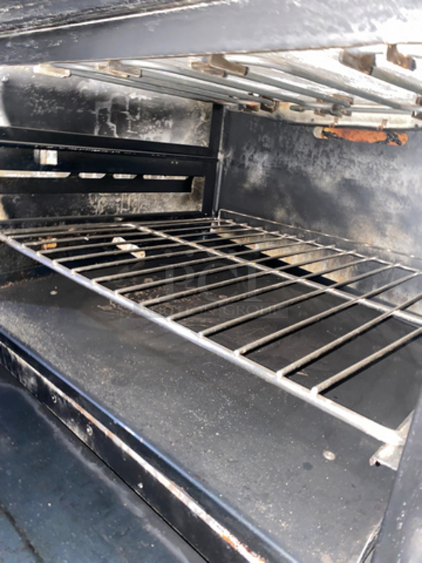 AN AMAZING FIND! Vulcan Commercial Natural Gas Powered 36 Inch French Top/24 Inch Flat Griddle Combo! With Backsplash & Overhead Salamander Shelf! With 2 Full Size Ovens Underneath! With Metal Oven Racks! All Stainless Steel! On Casters! Model: E60FL227 SN: 481550759 208/240V 1 Phase - Image 8 of 11
