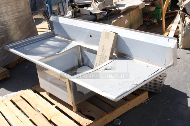 BRAND NEW SCRATCH & DENT! Regency 600S123232G 71" 16 Gauge Stainless Steel One Compartment Commercial Sink with Galvanized Steel Legs, Drain and 2 Drainboards - 23" x 23" x 12" Bowl Sink only. Out of original packaging.  - Image 3 of 6