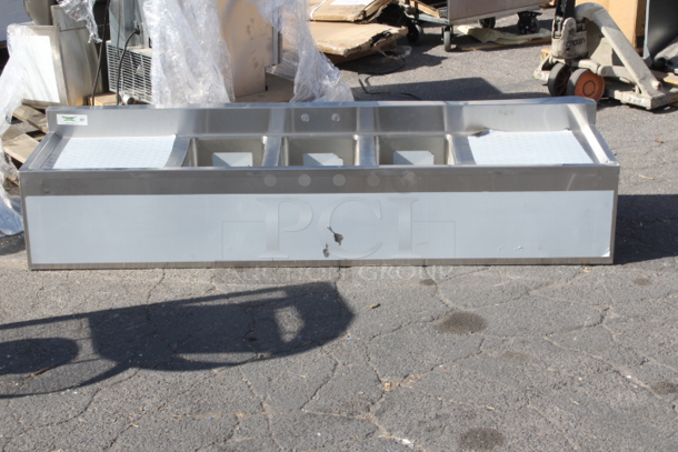 BRAND NEW SCRATCH & DENT! Regency 600B31014219 3 Bowl Underbar Sink with Two Large Drainboards - 72" x 18 3/4". Minor Denting. Sink Only. Minor damage to top of top right corner. see photos.  - Image 3 of 7