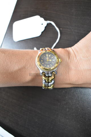 Tag-Heuer WG1320-2 Date Gray Dial Quartz Professional 200 mm Water Resistant Swiss Made Womens Watch