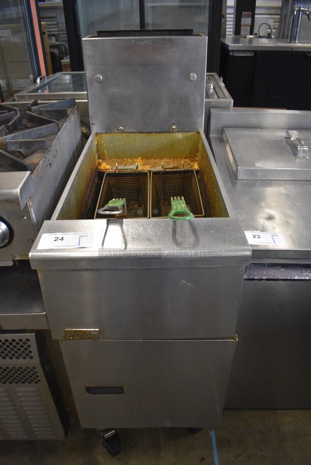 Pitco Frialator SG14 Stainless Steel Commercial Floor Style Natural Gas Powered Deep Fat Fryer w/ 2 Metal Fry Baskets on Commercial Casters. 16x34x46