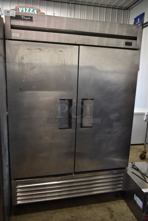 2017 True T-49F-HC Stainless Steel Commercial 2 Door Reach In Freezer w/ Poly Coated Racks on Commercial Casters. 115 Volts, 1 Phase. Tested and Powers On But Does Not Get Cold