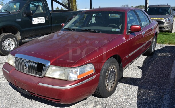 2003 Mercury Grand Marquis GS 4 Door Sedan. Odometer Reads 103,527. VIN 2MEFM74W43X614396. Title In Hand. Vehicle Runs and Drives! See Lot #4 For Additional Pictures. - Image 1 of 12