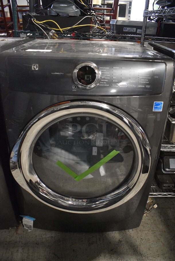 BRAND NEW! 2018 Electrolux EFME527UTT0 ENERGY STAR Front Load Dryer. 120/208-240 Volts, 1 Phase. 27x29x38.5
