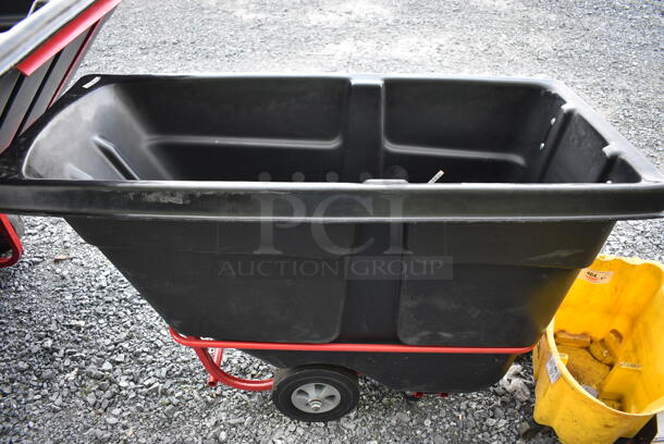 BRAND NEW! Rubbermaid Black Poly Portable Bin on Commercial Casters. 62x27x38 - Image 1 of 4