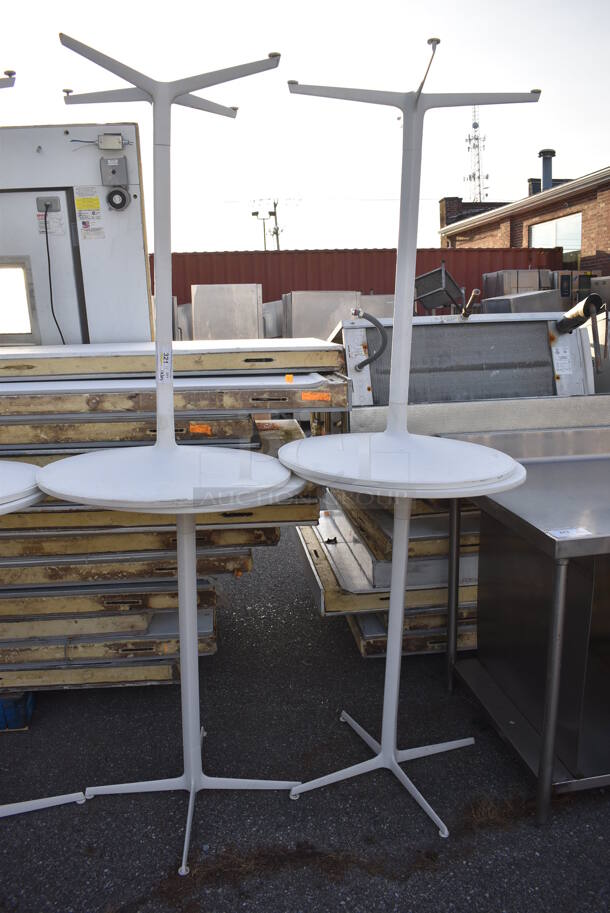 4 White Round Bar Height Tables on Metal Table Base. Stock Picture - Cosmetic Condition May Vary. 27.5x27.5x42. 4 Times Your Bid! - Image 5 of 5