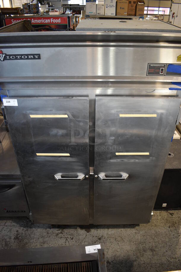 Victory RSA-2D-S7 Stainless Steel Commercial 2 Door Reach In Cooler on Commercial Casters. 115 Volts, 1 Phase. 52x36x83. Tested and Powers On But Does Not Get Cold