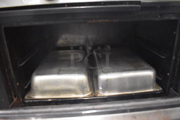 Garland Stainless Steel Commercial Natural Gas Powered 4 Burner Range w/ Left Side Flat Top Griddle, Oven, Over Shelf and Back Splash. 36x30x60 - Image 6 of 6