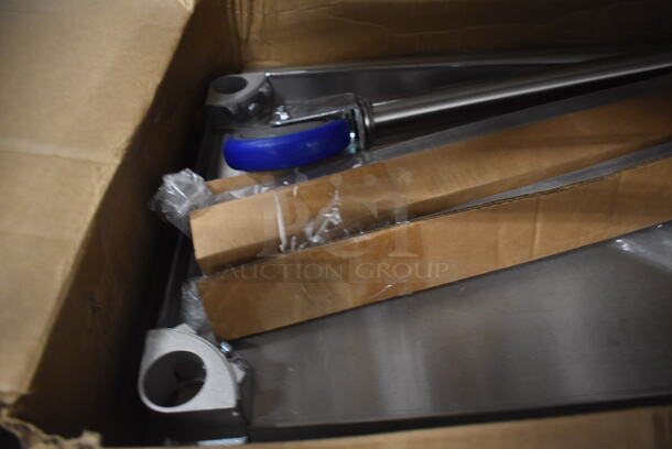 BRAND NEW IN BOX! Stainless Steel Table w/ Under Shelf and 3 Legs on Commercial Casters. Includes 27x17x2 - Image 2 of 3