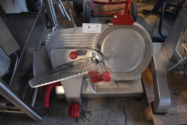 BRAND NEW SCRATCH AND DENT! 2022 Berkel B12-SLC Stainless Steel Commercial Countertop Meat Slicer w/ Blade Sharpener. Missing Center Plate Locking Knob. 115 Volts, 1 Phase. 26x22x21. Tested and Working!