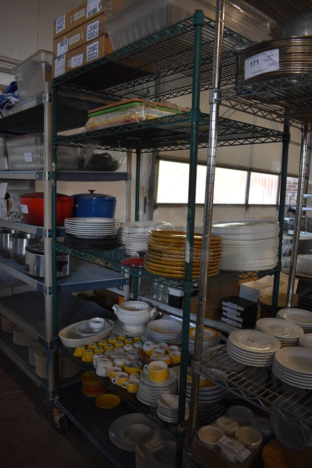 ALL ONE MONEY! Metro Lot of 5 Tiers of Various Items Including Poly Bin, Cutting Boards, Mugs, Plates and Saucers. Does Not Include Metro Shelving Unit