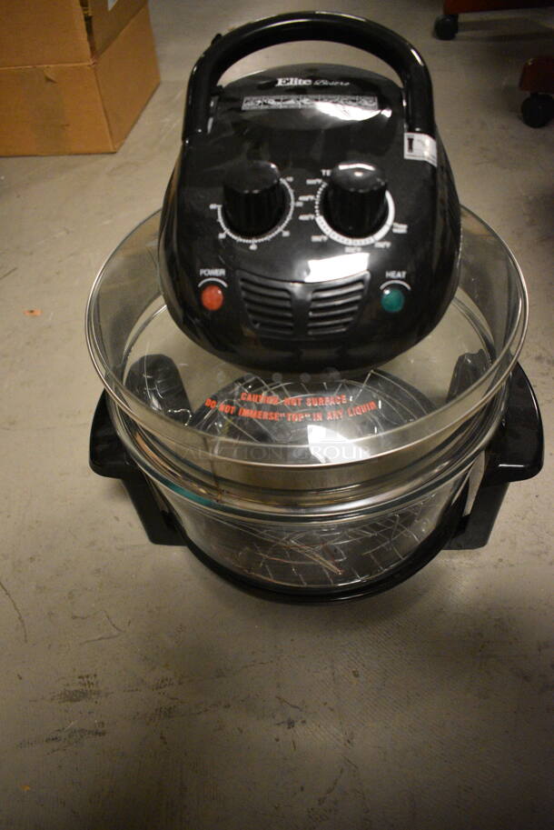 ALL ONE MONEY! Tier Lot of Various Items Including Panasonic Telephone, Audi Touch Up Set, Various Parts, and Elite Bistro Halogen Oven    - Image 6 of 8