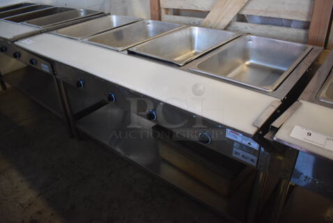 ServIt 423EST4WE750 Stainless Steel Commercial Electric Powered 4 Bay Electric Powered Steam Table w/ Drop Ins, Cutting Board and Under Shelf. 208/240 Volts. 58x30x33