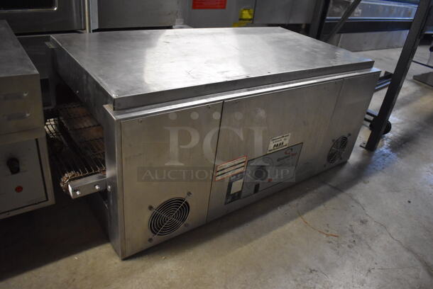 Holman 314HXM Stainless Steel Commercial Countertop Electric Powered Conveyor Oven. 220-250 Volts. 43x24x16