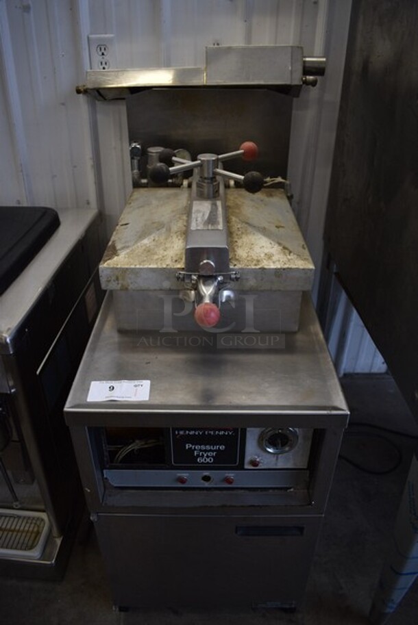 Henny Penny Model 600 Stainless Steel Commercial Floor Style  Natural Gas Powered Pressure Fryer on Commercial Casters. 80,000 BTU. 18x38.5x44.