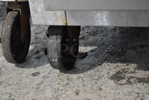 Continental 1R Stainless Steel Commercial Single Door Reach In Cooler w/ Racks on Commercial Casters. 115 Volts, 1 Phase. Tested and Working! - Image 4 of 7