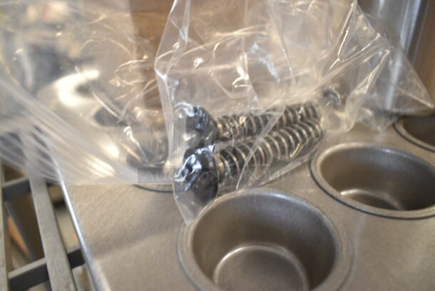 ALL ONE MONEY! Lot of BRAND NEW SCRATCH AND DENT! Items Including 2 Vollrath 78154 Stainless Steel 2.5 Qt. Vegetable Inset, Chicago Metallic 45245 24 Cup 2.1 oz. Glazed Aluminized Steel Mini Muffin Pan - 12 7/8" x 17 7/8", Bands. - Image 3 of 12