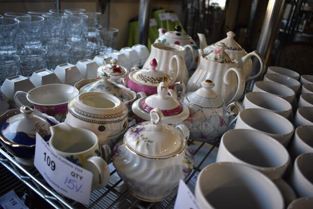 15 Various White Ceramic Items; Sugar Holder, Pitcher, Mugs and Tea Pot. Includes 10.5x5.5x7. 15 Times Your Bid! - Image 4 of 4