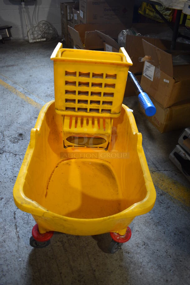 Yellow Poly Mop Bucket w/ Wringing Attachment on Commercial Casters. 13x22x25 - Image 1 of 3