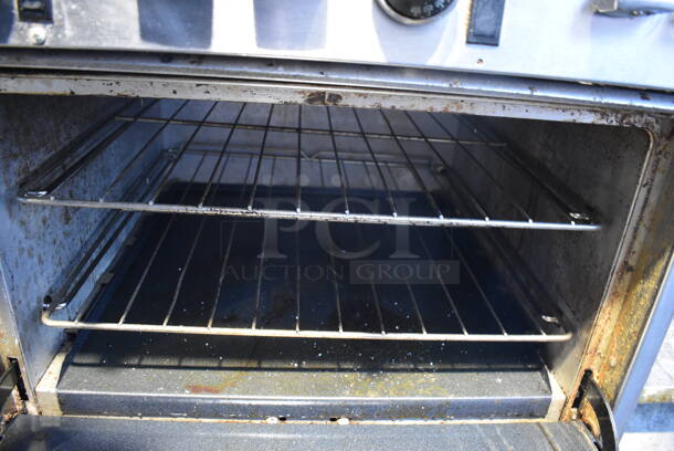 Southbend Select Stainless Steel Commercial Natural Gas Powered 6 Burner Range w/ Flat Top Griddle, Convection Oven, Oven, Over Shelf and Back Splash on Commercial Castesr. 61x35x60 - Image 9 of 9