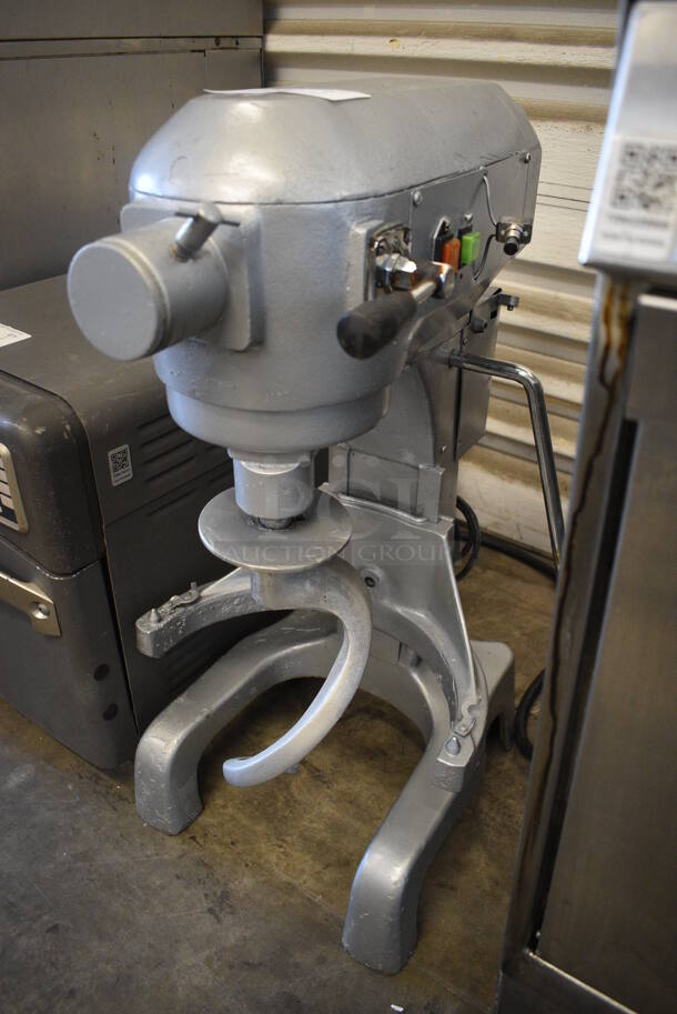 Metal Commercial 20 Quart Planetary Dough Mixer w/ Dough Hook Attachment. 110 Volts, 1 Phase. 15x21x32. Tested and Powers On But Parts Do Not Move