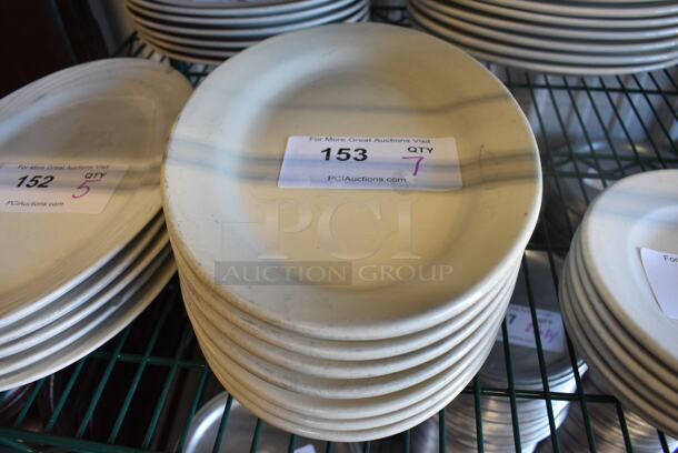 7 White Ceramic Oval Plates. 12x8x1. 7 Times Your Bid!
