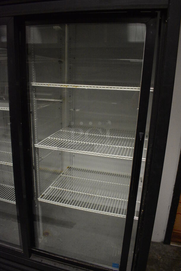 2014 True GDM-69-LD ENERGY STAR Metal Commercial 3 Door Reach In Cooler Merchandiser w/ Poly Coated Racks. 115 Volts, 1 Phase. 78.5x30x78.5. Item Was in Working Condition on Last Day of Business. (kitchen) - Image 3 of 7