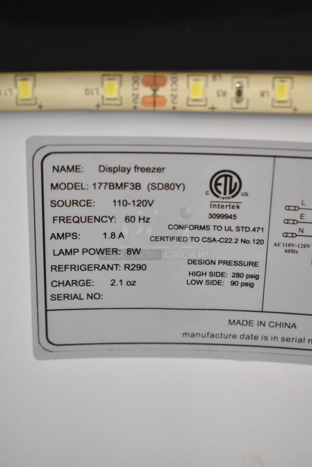 BRAND NEW SCRATCH AND DENT! Avantco 177BMF3B Metal Black Barrel Merchandiser Freezer on Commercial Casters. 110-120 Volts, 1 Phase. Tested and Working! - Image 7 of 7