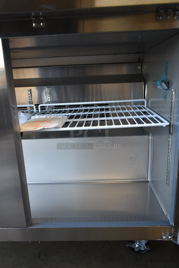 BRAND NEW SCRATCH AND DENT! 2023 KoolMore FWT-2D-12C Stainless Steel Commercial 2 Door Work Top Freezer w/ Back Splash on Commercial Casters. 115 Volts, 1 Phase. Tested and Working! - Image 8 of 8