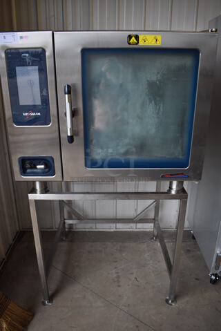 2016 Alto Shaam CTP7-20E Stainless Steel Commercial Electric Powered Combi Convection Oven on Commercial Equipment Stand. 208-240 Volts, 3 Phase. 43.5x40x75