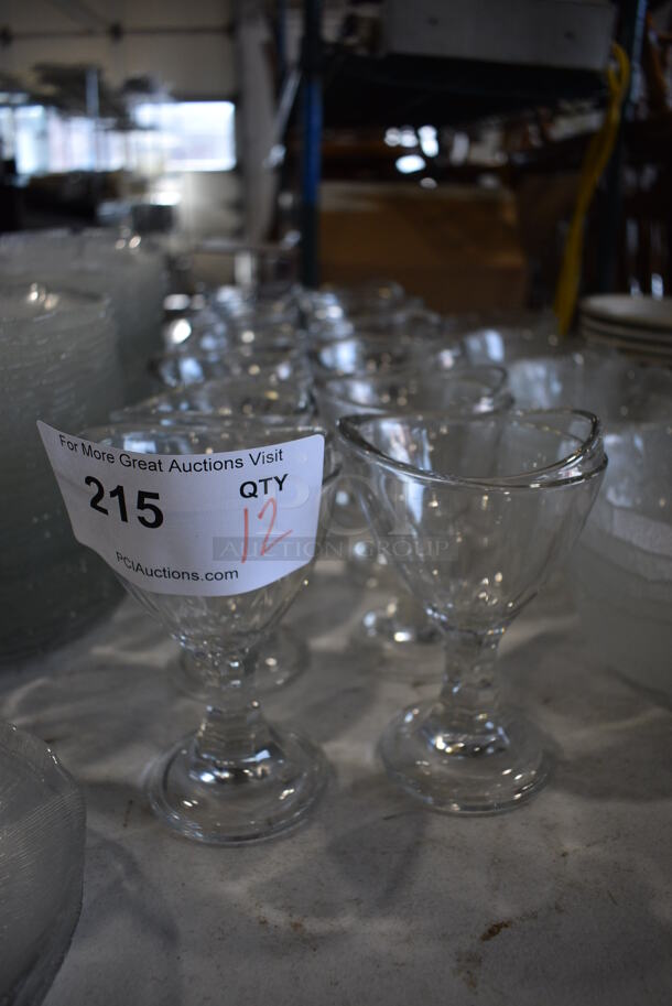 12 Wine Glasses. 4x3.5x6. 12 Times Your Bid!