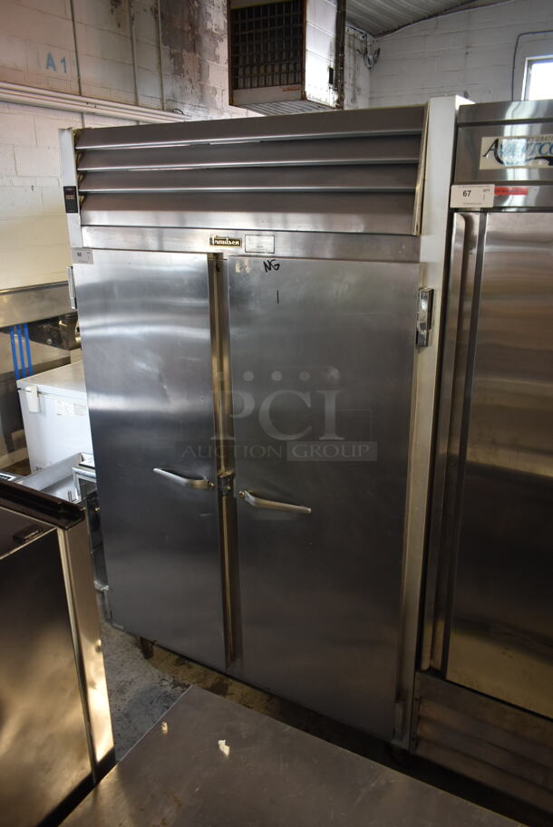 Traulsen G20010 Stainless Steel Commercial 2 Door Reach In Cooler w/ Poly Coated Racks on Commercial Casters. 115 Volts, 1 Phase.  Tested and Powers On But Does Not Get Cold - Image 1 of 7