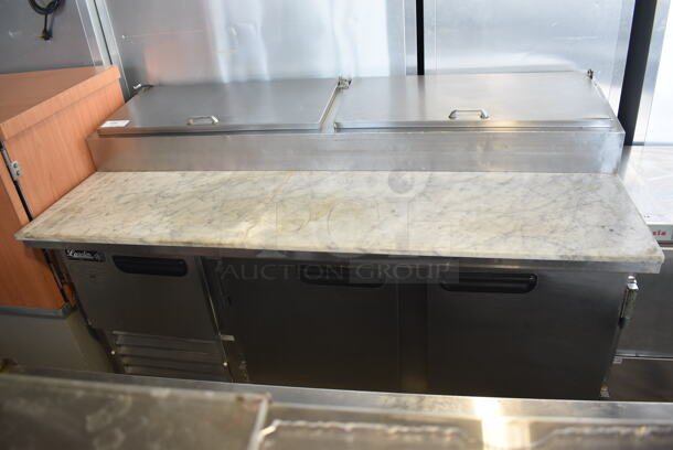 2014 Model Leader ESPT72SC Commercial Stainless Steel Electric Powered Pizza Prep Table With Enclosed Top For Plastic Ingredient Pans, Marble Style Prep Counter With Polycoated Racks on Commercial Casters. 115V Tested And Powers On But Does Not Get Cold - Image 1 of 9