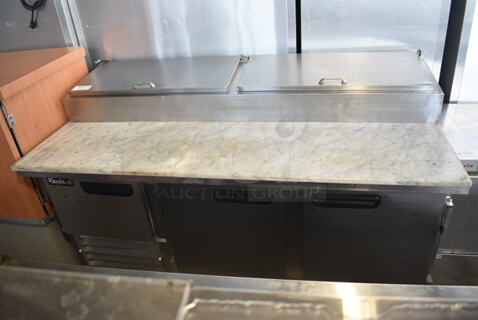 2014 Model Leader ESPT72SC Commercial Stainless Steel Electric Powered Pizza Prep Table With Enclosed Top For Plastic Ingredient Pans, Marble Style Prep Counter With Polycoated Racks on Commercial Casters. 115V Tested And Powers On But Does Not Get Cold